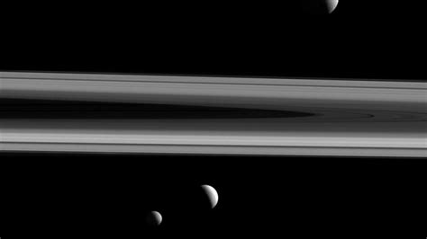 Cassini Views Saturns Moons Enceladus And Tethys