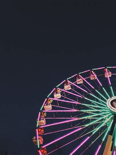 This project contains ferris wheel. Photo of Ferris Wheel with Neon Lights at Night · Free ...