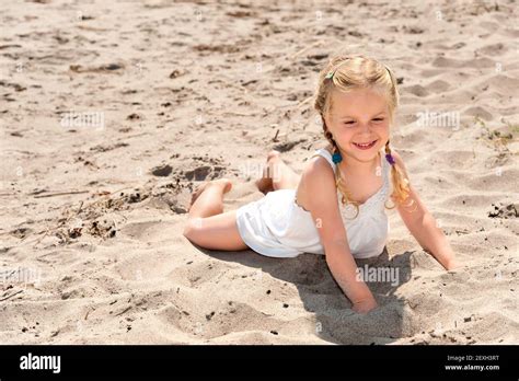 Cute Little Girl On The Beach Stock Photo Alamy