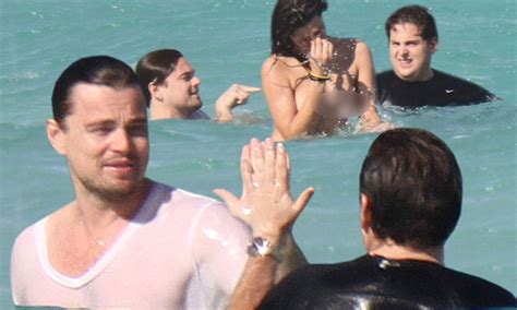 Leonardo Dicaprio And Jonah Hill Congratulate Each Other As They Take A Swim With A Topless