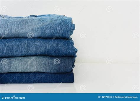 Stack Of Blue Jeans Isolated On White Background Stock Image Image Of