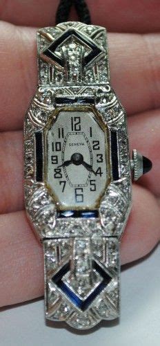 Touch of gold with black makes this platinum watch a high class engaging watch for. Antique Geneva Ladies Watch- Platinum, Diamonds ...
