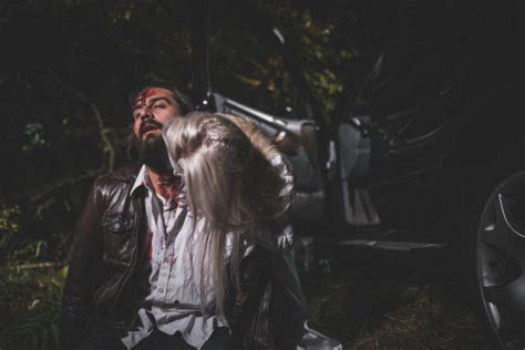 Female Vampire Is Biting A Young Man Stock Photos Pictures And Royalty