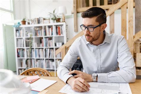 Young Man Architect In Office — Stock Photo © Sergeynivens 156276624