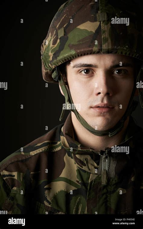 Studio Portrait Of Soldier In Uniform Stock Photo Alamy