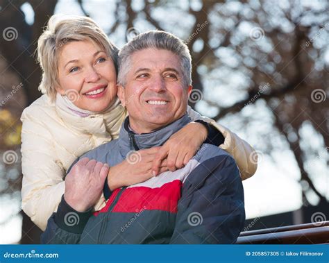 smiling mature couple relaxing in park stock image image of fold husband 205857305