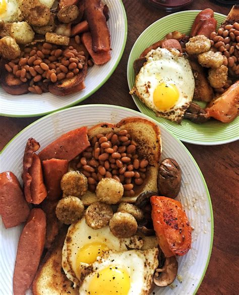 Sausage, bacon and egg is not just for breakfast, they also make a delicious combination on a sandwich at any time of day. OC A Proper English Breakfast For the Family- sunny side egg, baked beans, sausage, bacon ...