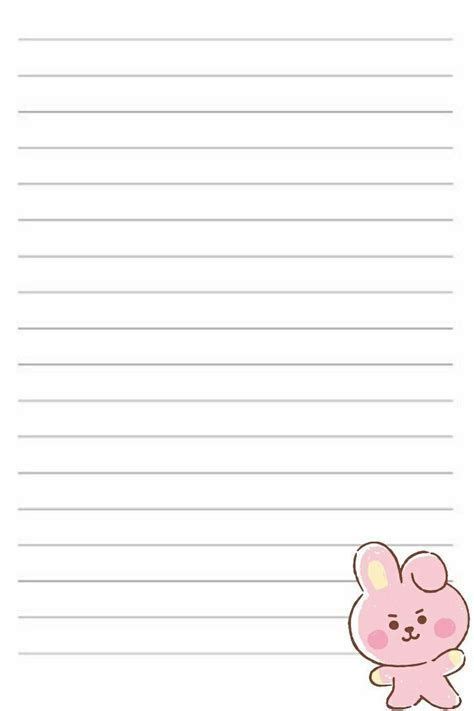 A Lined Paper With An Image Of A Pink Bunny Holding A Carrot On Top Of It