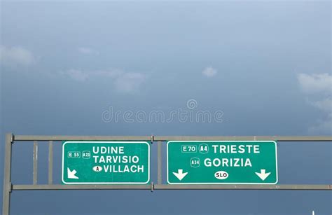 Road Sign Of The Italian Motorway With The Fork To Go To The Aus Stock