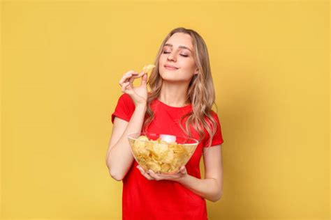 11600 Eating Potato Chips Stock Photos Pictures And Royalty Free