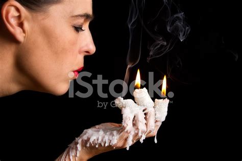 Three Candle Sticks On Fingers Buring Face Blow Stock Photo Royalty