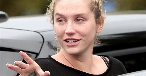 Kesha Goes Without Makeup Dons Sweats While Smiling Photo