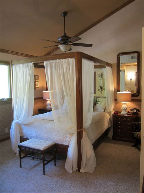 Canopy beds, which have been long considered a sign of luxury, which were carved and decorated chain canopy bed is a unique solution for industrial spaces. View of the canopy bed and new ceiling fan. | Bed ...