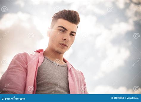 Casual Man Looking Down To The Camera Stock Photo Image 41025050