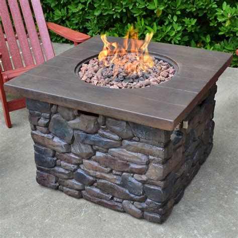 They can be as essential as a diy fire pit in your patio as extravagant as a full stone fireplace if you have got a massive area with lots of space and need outland living series propane gas patio fire pit table. Tortuga Outdoor Yosemite Faux Wood/Stone Propane Fire Pit ...