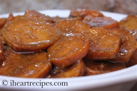In a medium pot, bring water and sugar to a rolling boil, add butter, lemon juice, nutmeg, cinnamon and sliced yams or sweet potatoes. Baked Candied Yams - Soul Food Style! | I Heart Recipes ...