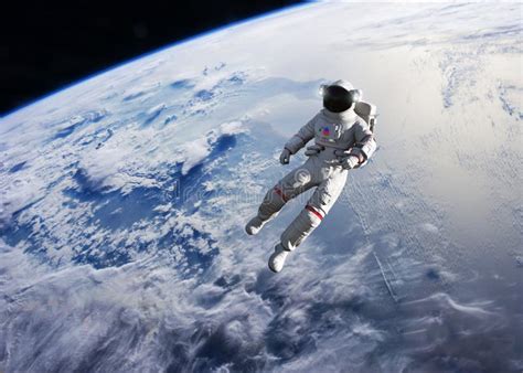 Astronaut Conducting Spacewalk On Earth Orbit Stock Photo Image Of