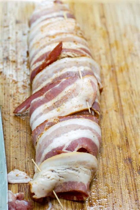 Nestle prepared pork into center of baking sheet, with bacon seam side up. Traeger Bacon Wrapped Pork Tenderloin Recipes | Dandk Organizer