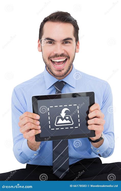 Composite Image Of Happy Businessman Showing His Tablet Pc Stock Image