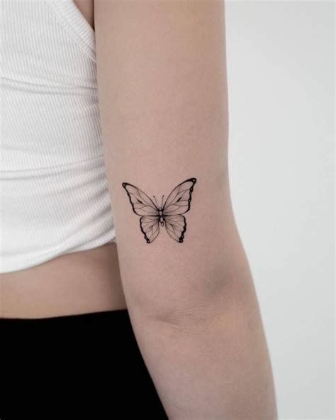 Fine Line Butterfly Tattoo On The Tricep Tattoos Purple Tattoos Butterfly Tattoo