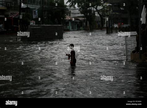 Philippines 4th Aug 2018 A Boy Stands On A Flooded Street After A