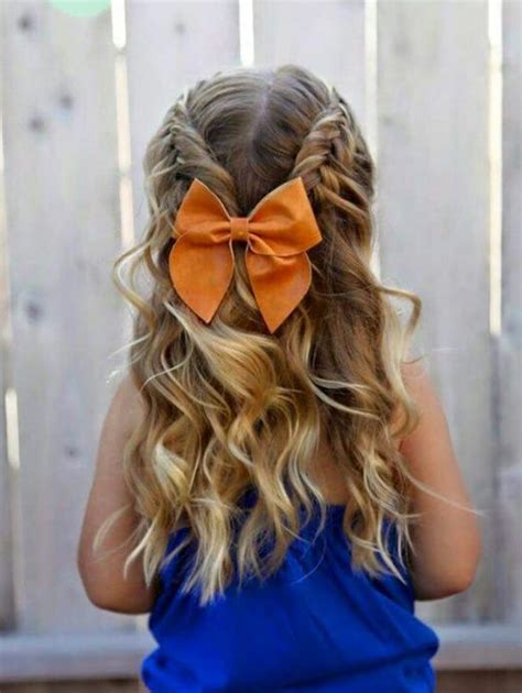It's all wavy and some are left there at the back while a few layers come forward over the shoulders. 35 Cute & Fancy Flower Girl Hairstyles for Every Wedding