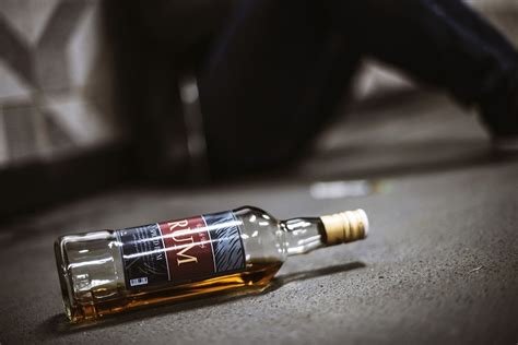 Download Premium Image Of Liquor Alcohol Bottle Lying On The Floor 9529 Alcohol Bottles