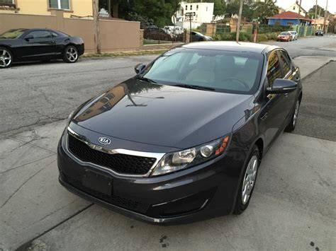 A 2011 kia optima lx luxury edition with custom rims, tint, and other accessories. Used 2011 Kia Optima LX Sedan $7,690.00
