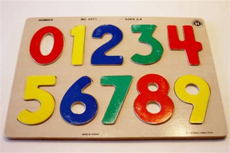 This beautiful number puzzle board features numbers up to 20 and plus, minus and equals signs for extended learning. Vintage Wooden Number Puzzle by Small World Toys 1994 ...