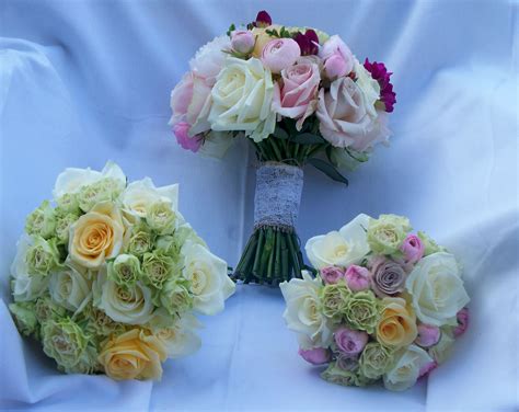 Soft Avalanche Roses With Pink Peonies And Ranunculus And Pops Of