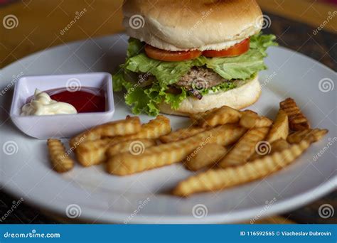Fresh Burger With Meat Cutlet French Fries Ketchup And Mayonnaise