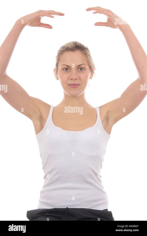 Young Woman Raising Arms Above Head Model Released Stock Photo Alamy