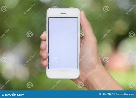 Hand Holding Smartphone On Abstract Bokeh Stock Image Image Of