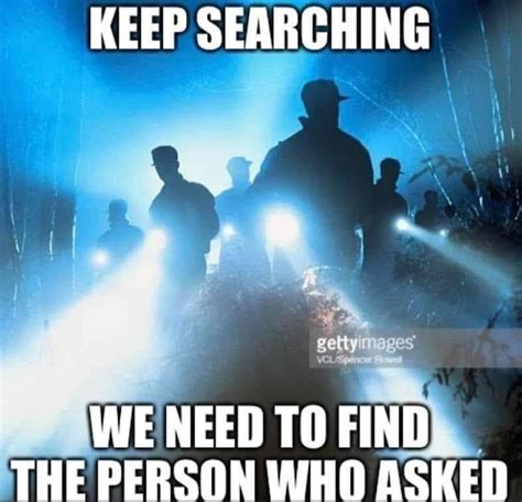 Some People Are Standing In The Dark With Their Lights On And One Person Is Looking At Something