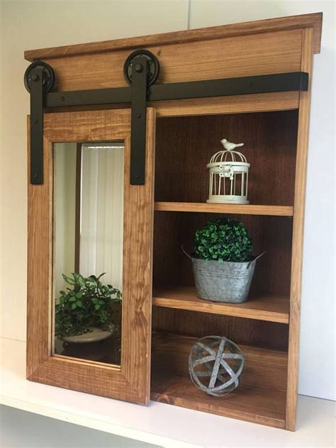 I need ideas for sliding cabinet doors the version hi tech rails work very neatl diy door hardware. I love this barn door cabinet. IT is perfect for our ...