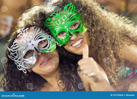 Rio De Janeiro February 10 Two Girls In Masks In Stands On Ca