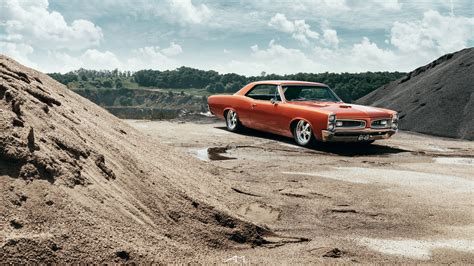 Orange Pontiac Gto Rolling On Chrome Wheels — Gallery