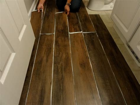 Here's what you need to know about vinyl peel and stick flooring is made from a vinyl material that's roughly 0.3 to 0.5 millimeters thick (much thicker than wallpaper). Vinyl Wood Plank Flooring Peel And Stick | Faux wood ...