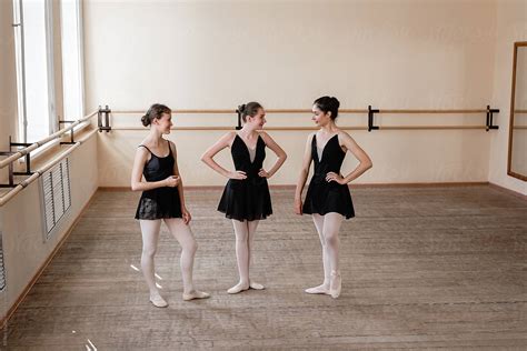 Young Ballerinas Talking During Break By Stocksy Contributor Milles