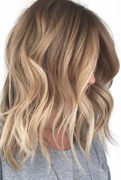 Medium Length Hair With Blonde Highlights