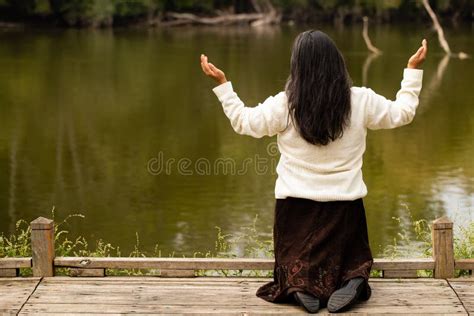 Praying Woman Kneeling Hoodoo Wallpaper