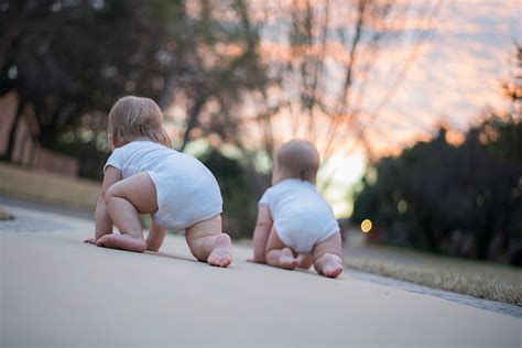 Crawling is a major milestone for babies. How to Get Twins to Crawl