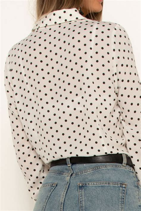 white polka dot shirt height of fashion