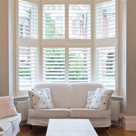Make an appointment with your local tailor and bring a few favorite clothing pieces with you. How do you best dress a bay window? | The Great Shutter Co.