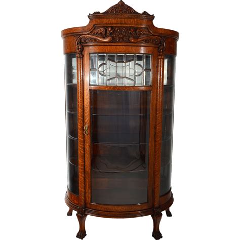 American Oak China Cabinet With Leaded Glass Door And Curved Side