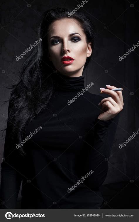 Portrait Of The Young Smoking Girl Stock Photo By ©flexdreams 152782920