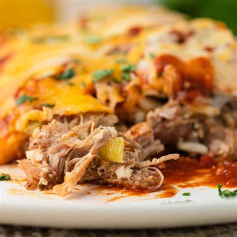 Pork Carnita Enchiladas Are A Delicious Way To Use Your Slow Roasted
