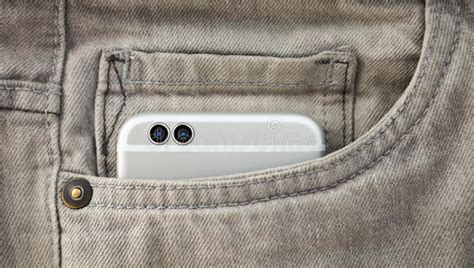 Modern Dual Camera Smart Phone In Jeans Pocket Stock Photo Image Of