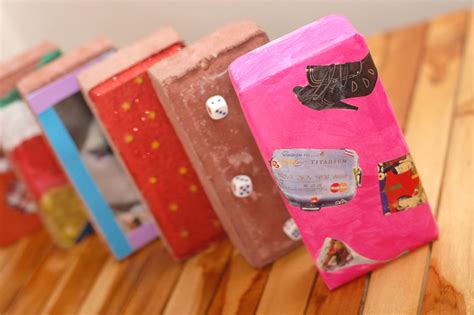 Start by cutting a piece of card board that is 19.5 inches long and 2.5 inches wide. Make Bookends out of Bricks | Crafts for teens, Bookends, Book crafts