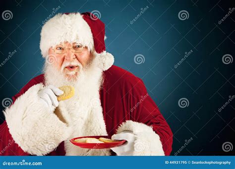 Santa Eating A Sugar Cookie Stock Image Image Of Looking Senior